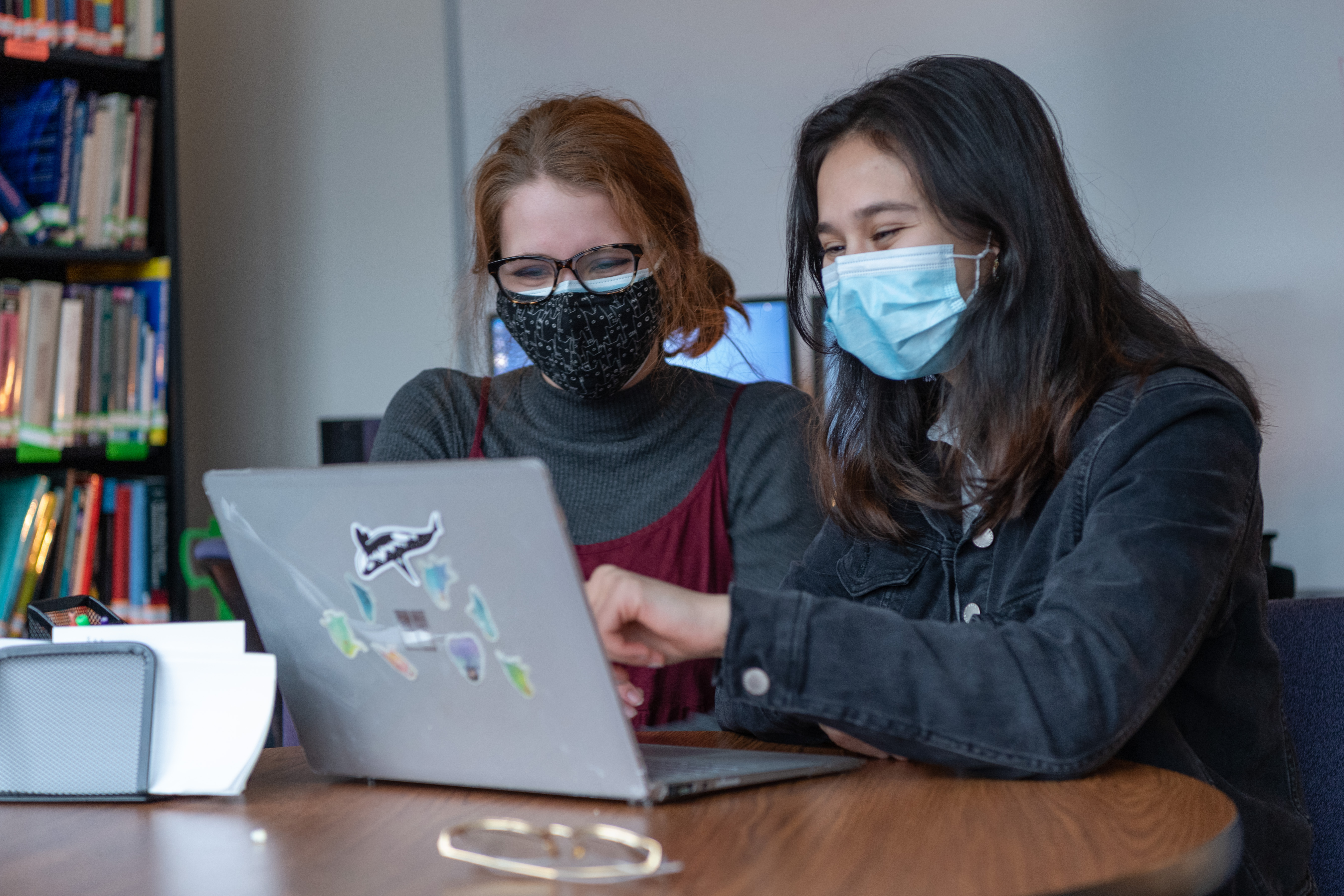 Tutors working with masks on